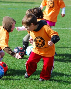 Kids playing soccer photo