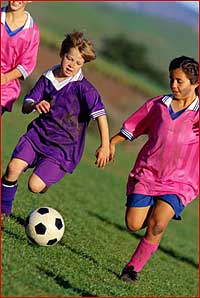 Kids playing soccer photo